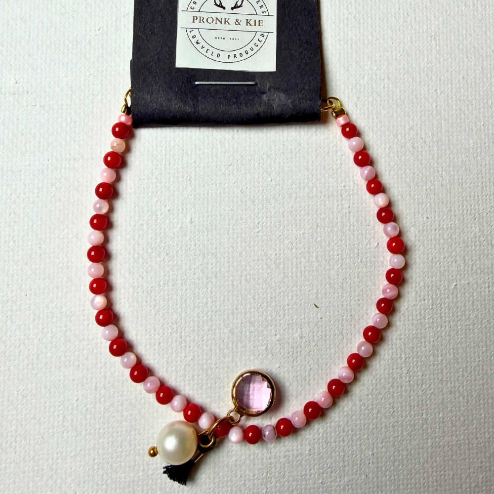 Armband - lig en donkerpienk krale