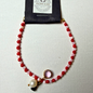 Armband - lig en donkerpienk krale