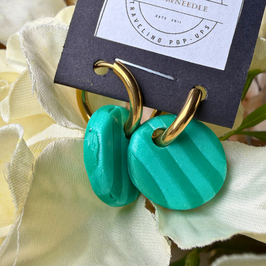 Oorbelle - goudkleur en groen