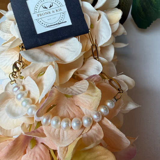 Armband - krale en skakels: goudkleur